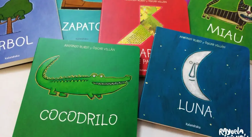 Primeros libros para bebés: "Cocodrilo", "Zapato", "Miau", "Luna", "Árbol" y más, con ilustraciones coloridas.