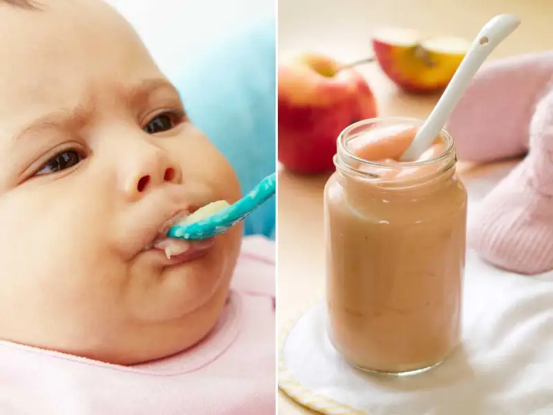 Bebé de 4 meses probando su primera fruta. Puré de manzana en un tarro y una cuchara.